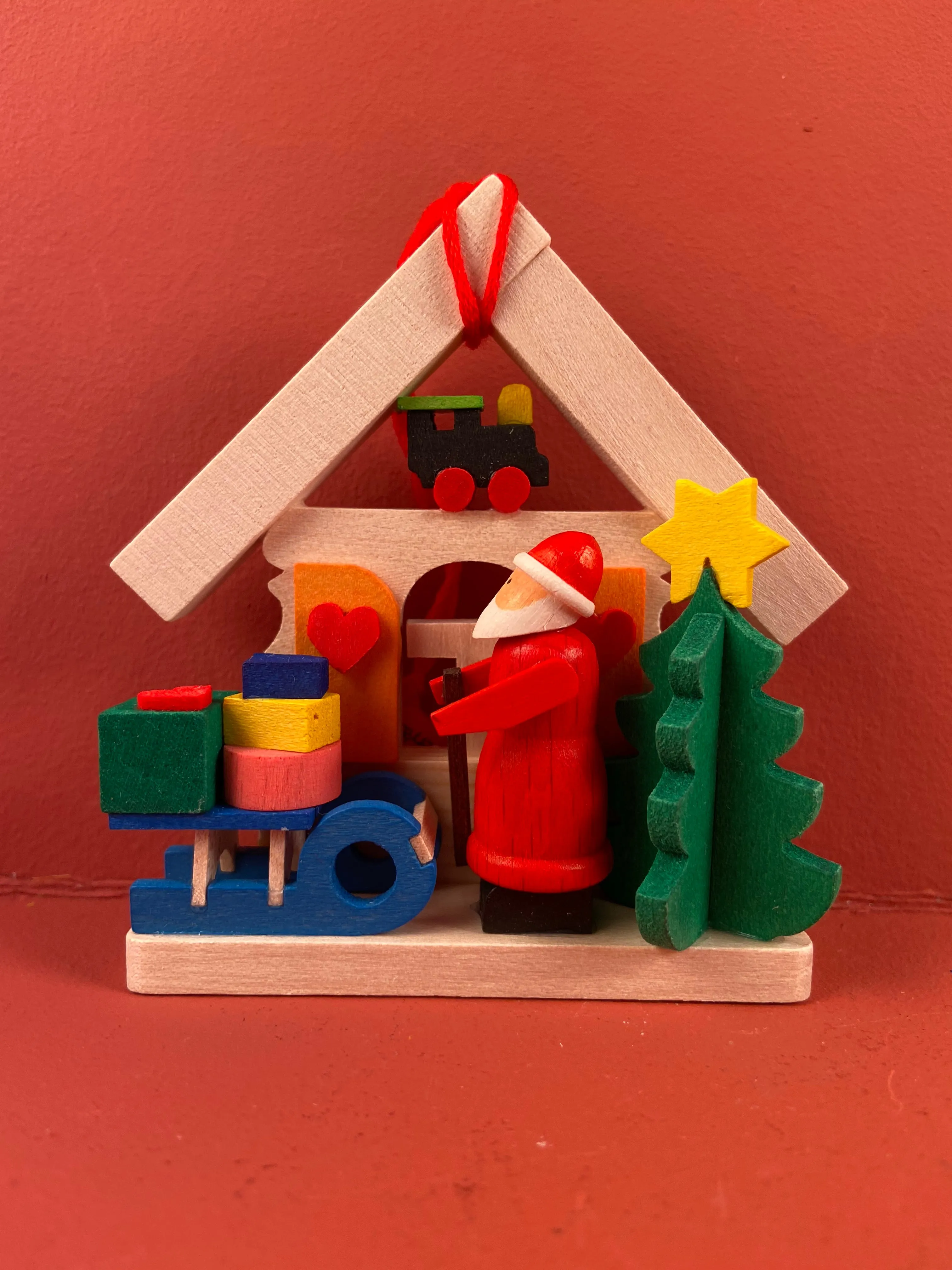 German Christmas Ornament: Santa with Sled