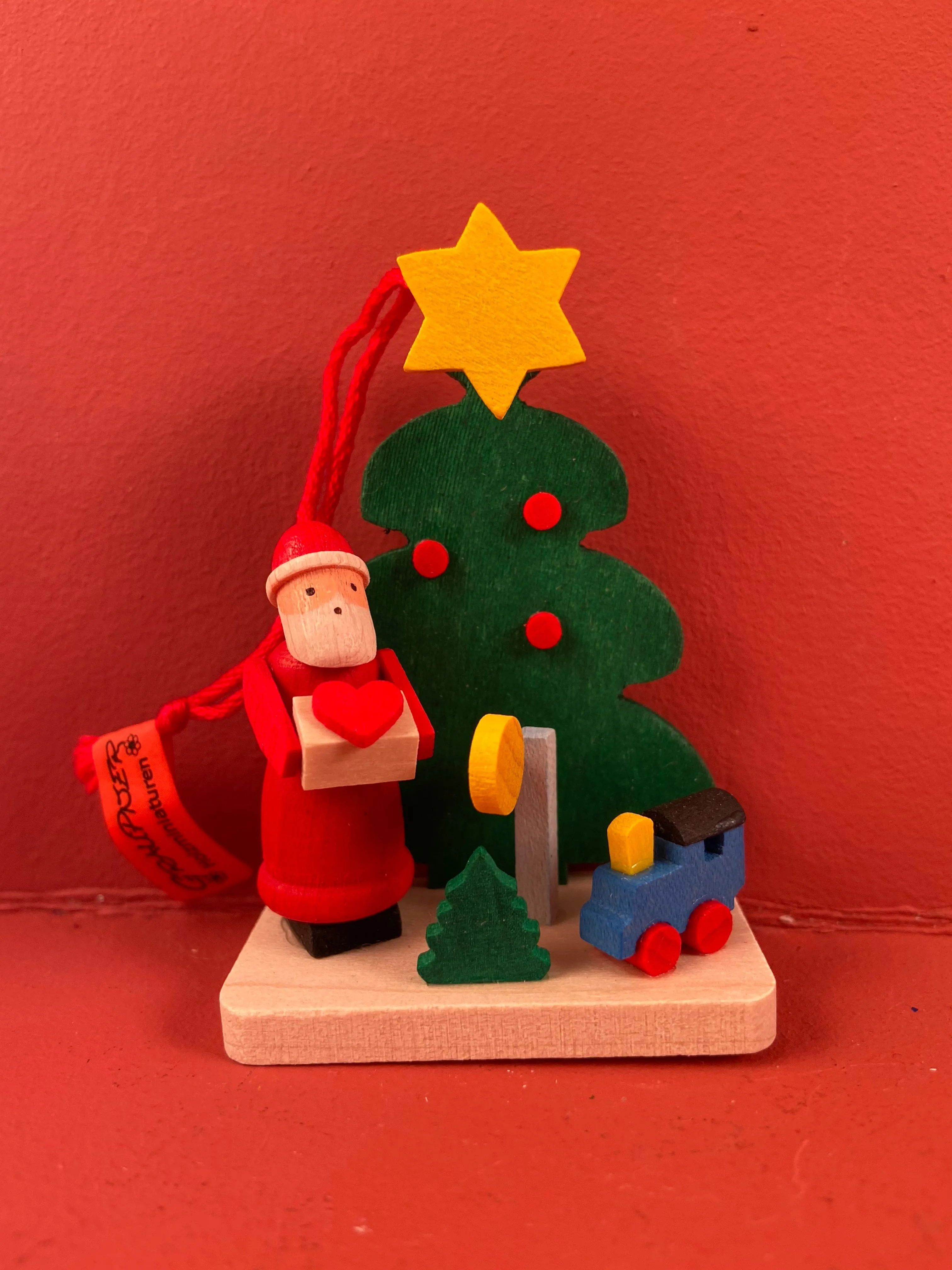 German Christmas Ornament: Tree with Santa & Toys